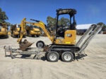 Caterpillar-301.7CR-dOccasion-–-Mini-Pelle-Compacte-avec-3-Godets-et-Remorque-3-380×380