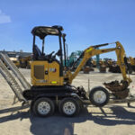 Caterpillar 301.7CR d’Occasion (2021) – Mini-Pelle + 3 Godets + Remorque